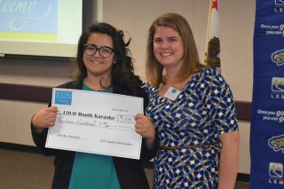 Local student entrepreneurs "pitch" their ideas to local education and business leaders Thursday night's winner was Saylor Lopez with her "Loudmouth Karaoke." She's with Lemoore Chamber Coordinator Britanny Reece.